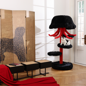 A black cat tree with red tentacles crafted as an aesthetic cat tree for modern interiors.