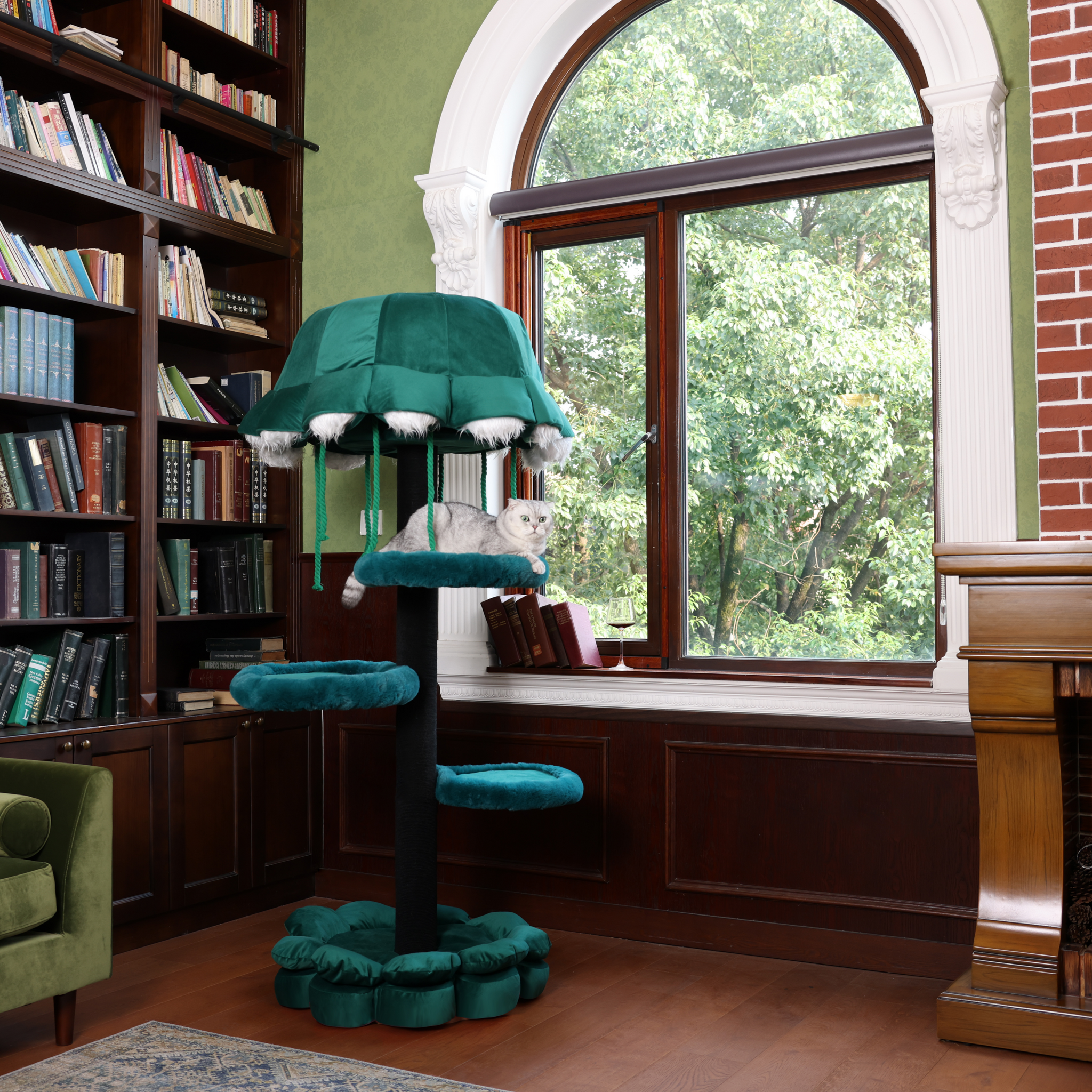 A green cat tree built on a sturdy wood cat tree frame with a jellyfish-style canopy.