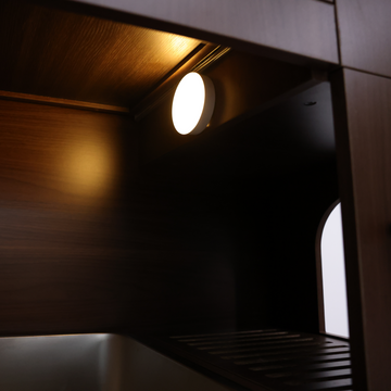 cabinet with litter box with light